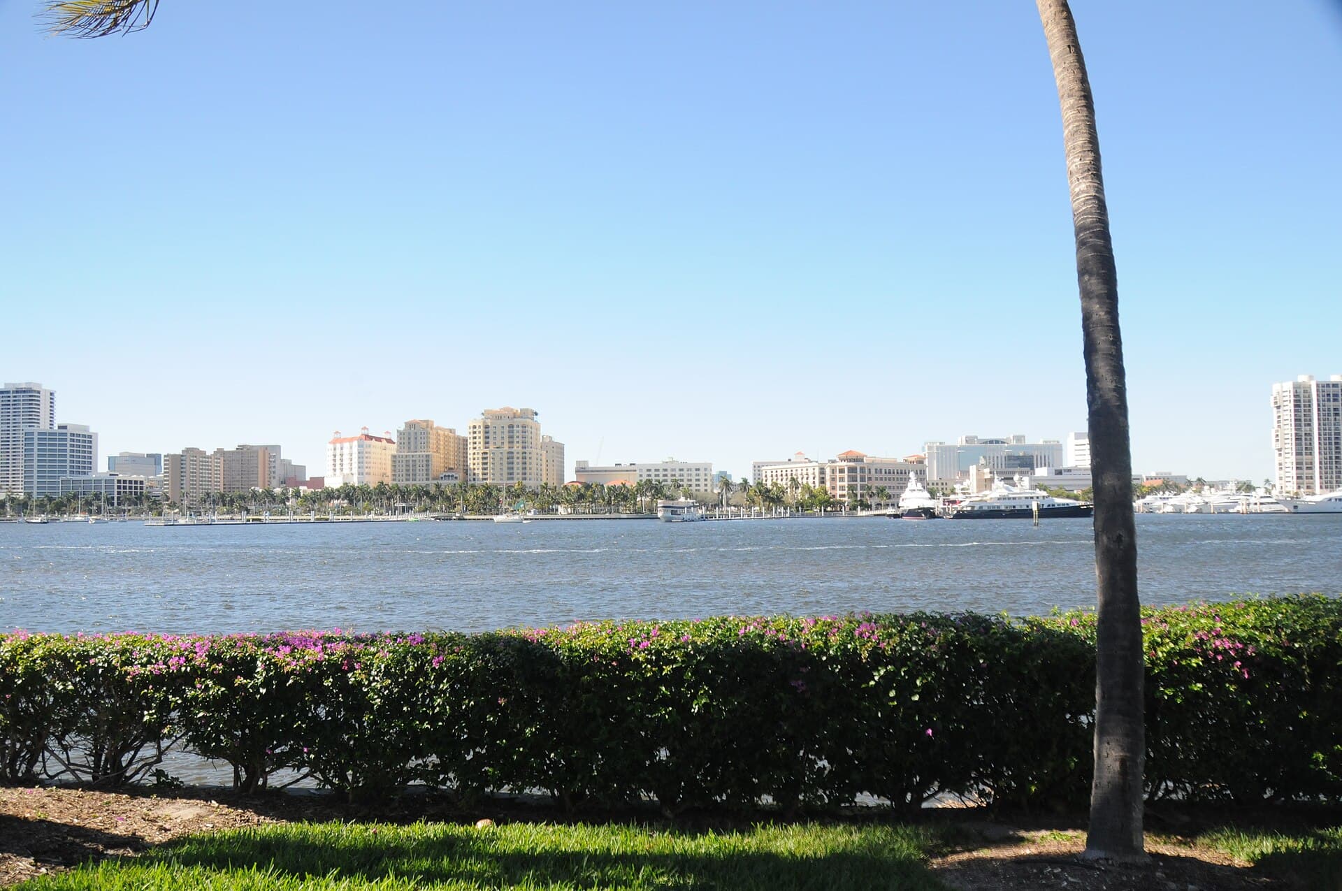 Waterfront seawalls and skyline along Lake Worth Lagoon in West Palm Beach, Florida